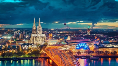 magnificent view of cologne germany - sky, wallpaper, buildings, cologne, train station, river, clouds, architecture, city, cathedral, bridge, germany, new, lights