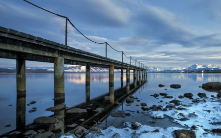 blue rocky beach - blue, water, architecture, bridge, rocks