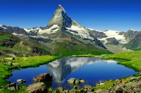 The Matterhorn mountain - calm, amazing, reflection, crystal, mountain, shore, gorgeous, peak, cliffs, lake, nice, sky, water, beautiful, snowy, mirrored, lovely, Matterhorn, clear, rocks