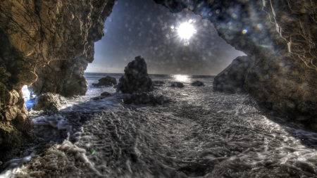 splashing waves in a sheshore grotto hdr - shore, hdr, waves, sea, splash, rocks, sun, grotto