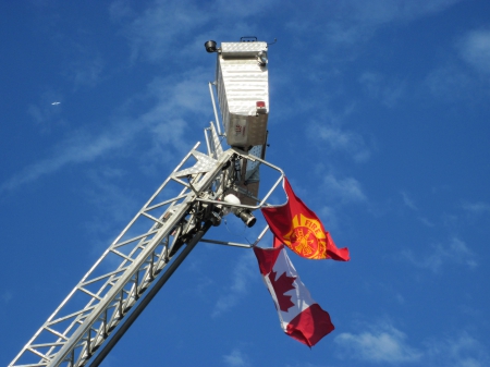 Fire Ladder for a day of Charity in Town - blue, red, photography, ladder, Sky, flag