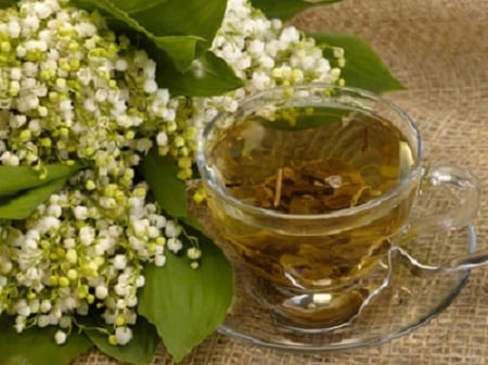 lily of the valley and cup of tea - tea, flowers, still life, cup