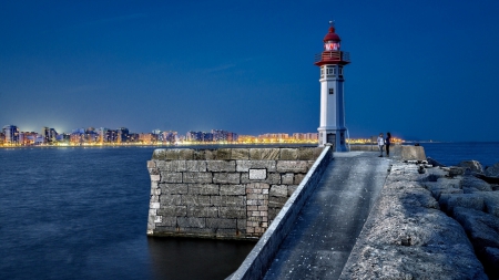 wonderful lighthouse at harbor entrance in spain - stone, lighthouse, lights, harbor, city, pier