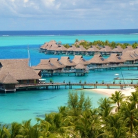 Hilton Bora Bora Resort - Water Bungalows over Blue Lagoon Ocean