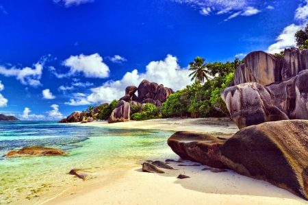 La Digue, Seychelles - clouds, palms, sea, sand, rocks, sky