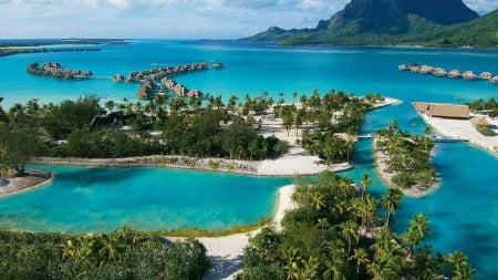 Blue Lagoon and luxury Resorts on Bora Bora Paradise Island Polynesia - villas, lagoon, blue, pacific, beach, perfect, island, french, polynesia, sand, mountain, tahiti, atoll, exotic, palm trees, paradise, hotel, south, luxury, bungalows, water, reef, beautiful, sea, resort, ocean, islands, coral, shallow, tropical, bora bora, volcanic