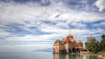 chillon castle on geneva lake in switzerland - lake, shore, castle, clouds