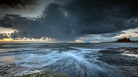 wonderful bamburgh castle on the english coast - sundown, clouds, castle, shore, sea, lights, rocks