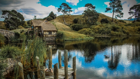 magnificent cabin on a lake - lake, hills, thatched roof, cabin, bridge