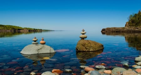 North Shore Lake Superior, Bordering Minnesota, Wisconsin, Canada - minnesota, water, wisconsin, superior, canada, nature, lake, sky, rocks