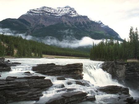 out there - mountains, waterfalls, pine trees, river