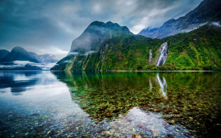 Misty mountain - reflection, crystal, mountain, misty, shore, mist, lake, cloudy, sky, clouds, falling, mirrored, fall, river, nature, waterfall, clear