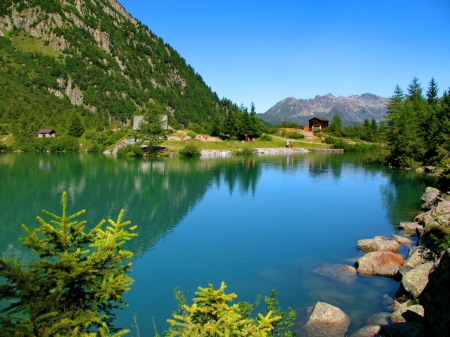 Lake in Italian Alps - nice, sky, slope, italy, clear, mirrored, crystal, mountainscape, view, quiet, reflection, calmness, emerald, green, tree, lake, landscape, mountain, summer, shore, lovely, serenity, nature, blue, beautiful, alps, waters, stones