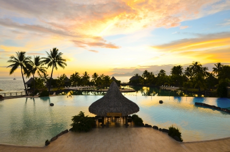 Sunset over Tahiti - beach, beautiful, evening, sea, island, polynesia, ocean, tahiti, islands, sunset, tropical, swimming, pool, dusk, paradise