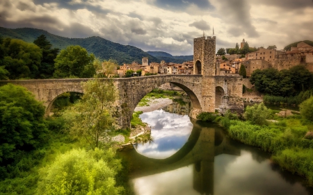 bridge in the ancient town of besalu spain - spain, trees, mountains, wallpaper, town, river, clouds, architecture, old, bridge, bridges, new