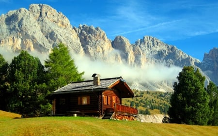 Mountain cottage - lonely, cabin, grass, mountain, mist, cliffs, nice, hut, cottage, sky, beautiful, slope, lovely, rest, stones, wooden, nature, rocks