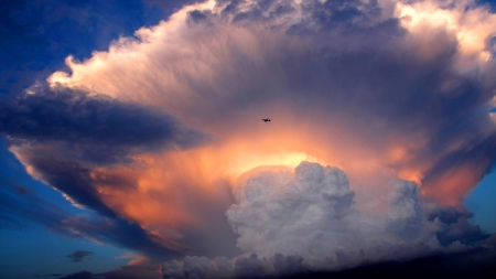 silhouette of a plane on a mighty cloud - cloud, silhouette, sky, plane