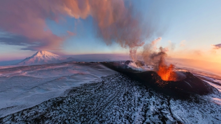 eruptions on a snow covered volcano - volcano, eruption, snow, smoke, steam, mountains