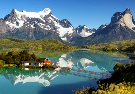 Lake Pehoe - nice, cottage, slope, chile, water, clear, mirrored, rocks, crystal, view, house, bridge, cliffs, lake, shore, lovely, peaks, pehoe, beautiful, stones, cabin