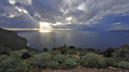 magnificent sunbeams through clouds on a bay - sunbeams, clouds, shore, bay, bushes