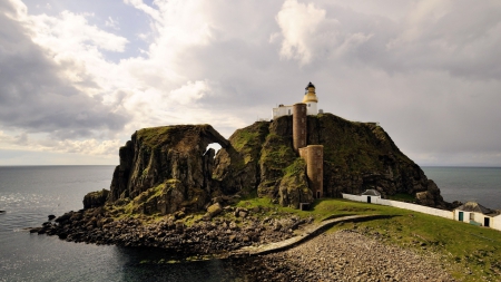 amazing entrance to a lighthouse on the cape - entrance, lighthouse, clouds, rock, cape, sea