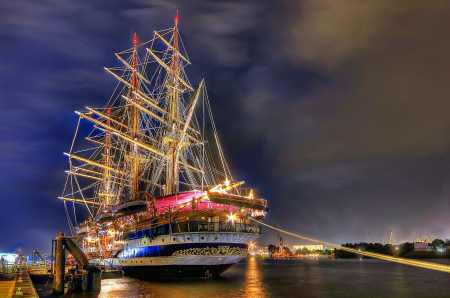 Sailship Amerigo Vespucci at Hamburg Port - masts, water, reflection, clouds, evening, light