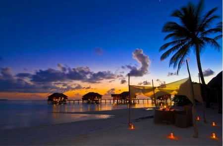 Tropical Beach Sunset Dining - beach, pacific, paradise, candles, water, bungalows, sunset, table for two, polynesia, dine, evening, dining, orange, lagoon, south, sand, dusk, ocean, islands, night, tropical, exotic, eat, romantic, villas, island, sea, tahiti