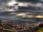 fantastic sunbeams over a town