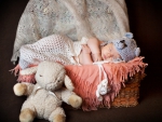 Baby and teddy bear