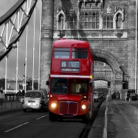 vintage double decker bus in london on tower bridge