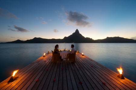 Sunset Table for Two Bora Bora - paradise, candles, sunset, table for two, polynesia, view, evening, bora bora, dining, dine, food, dusk, ocean, islands, night, tropical, exotic, eat, romantic, island, sea, tahiti, lights