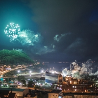 fireworks over a bay