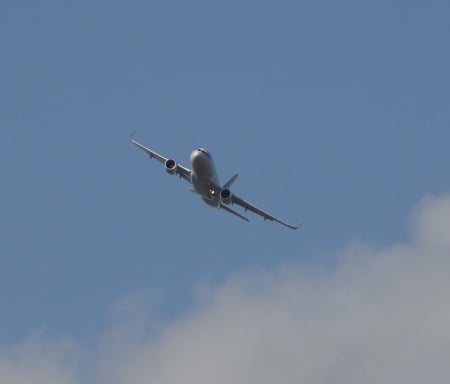 Banking Left Above the Clouds - airplane, aircraft, plane, jet