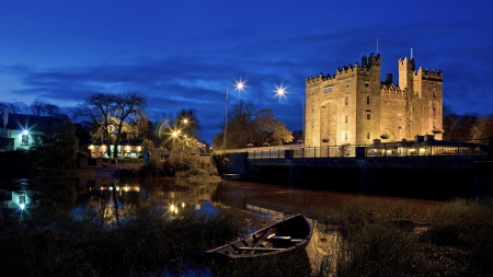 ancient fortress by a river at night - fortress, lights, river, boat, city, night