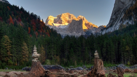 rock balancing in gorgeous landscape - balance, forest, mountains, rocks