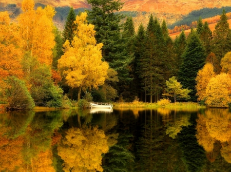 Scottish mirror - nice, autumn, trees, clear, foliage, calm, crystal, fall, quiet, river, scotland, pond, boat, lake, falling, mountain, shore, lovely, serenity, nature, forest, mirror, tranquil, beautiful, waters, canoe