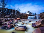 house above a waterfall