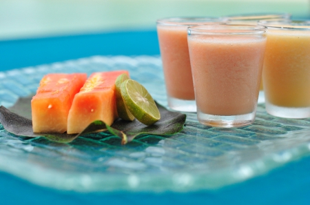 Fruit and Smoothie by the Beach - beach, pacific, paradise, melon, polynesia, bora bora, dine, food, ocean, cocktail, tropical, exotic, fruit, eat, island, smoothie, sea, drinks, tahiti