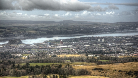 panoramic view of a riverside town - view, town, hills, river, clouds, panorama