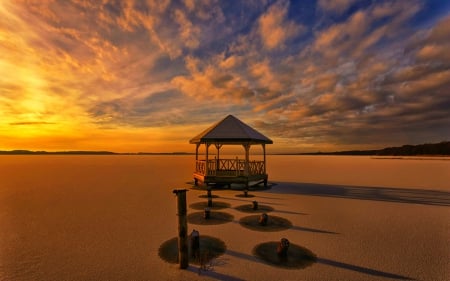 The traces - sands, sky, cottage, clouds