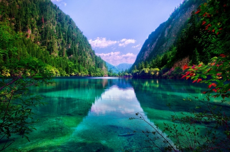 Mountain and lake - tranquil, reflection, crystal, mountain, shore, cliffs, lake, nice, emerald, sky, clouds, trees, beautiful, mirrored, slope, lovely, nature, clear