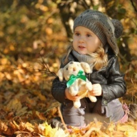 Little Girl In Autumn