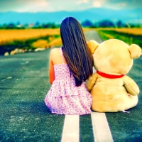 Girl and teddy bear