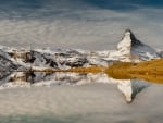 the matterhorn reflected in a lake