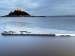 golden castle on an off shore island