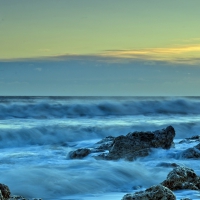 superb sea waves on a rocky shore