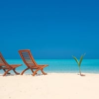 Decks Chairs on White Sand