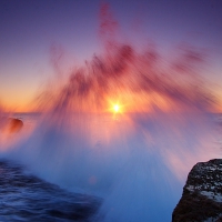 magnificent sea waves at sunset