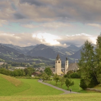 church in a meadow of a valley town