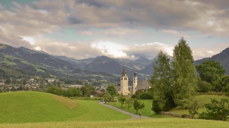 church in a meadow of a valley town - clouds, town, grass, meadow, mountains, church, valley